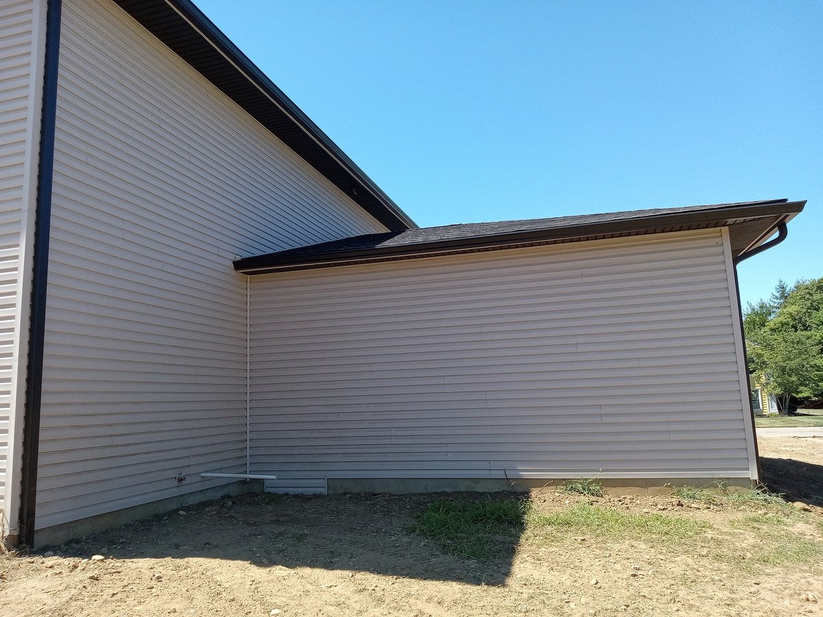 Home improvements vinyl siding and gutters